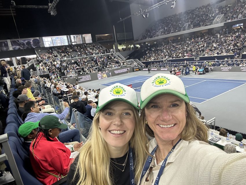 Two Bark Ballers in caps at the Dallas Open